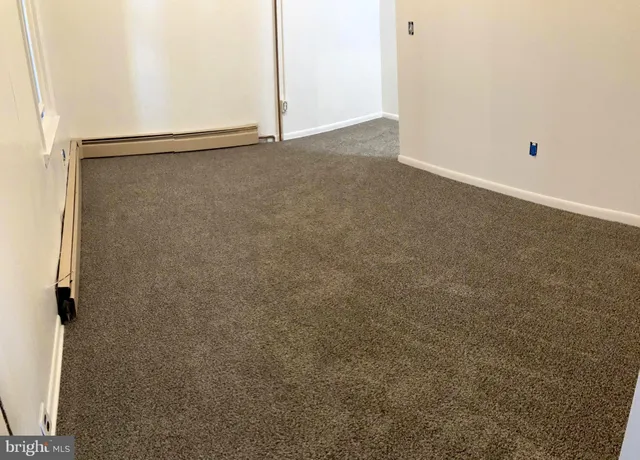 an empty room with a door