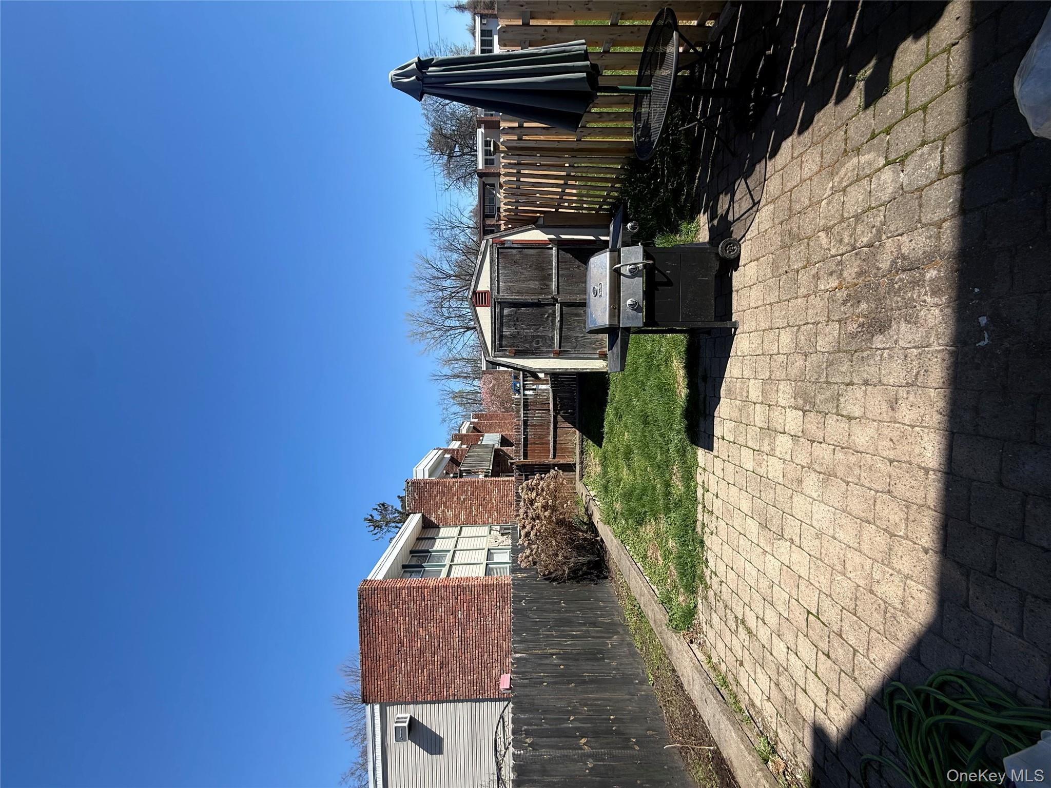39 Coolidge Street Haverstraw, NY 10927 - Photo 13 of 13 a view of a terrace with a garden
