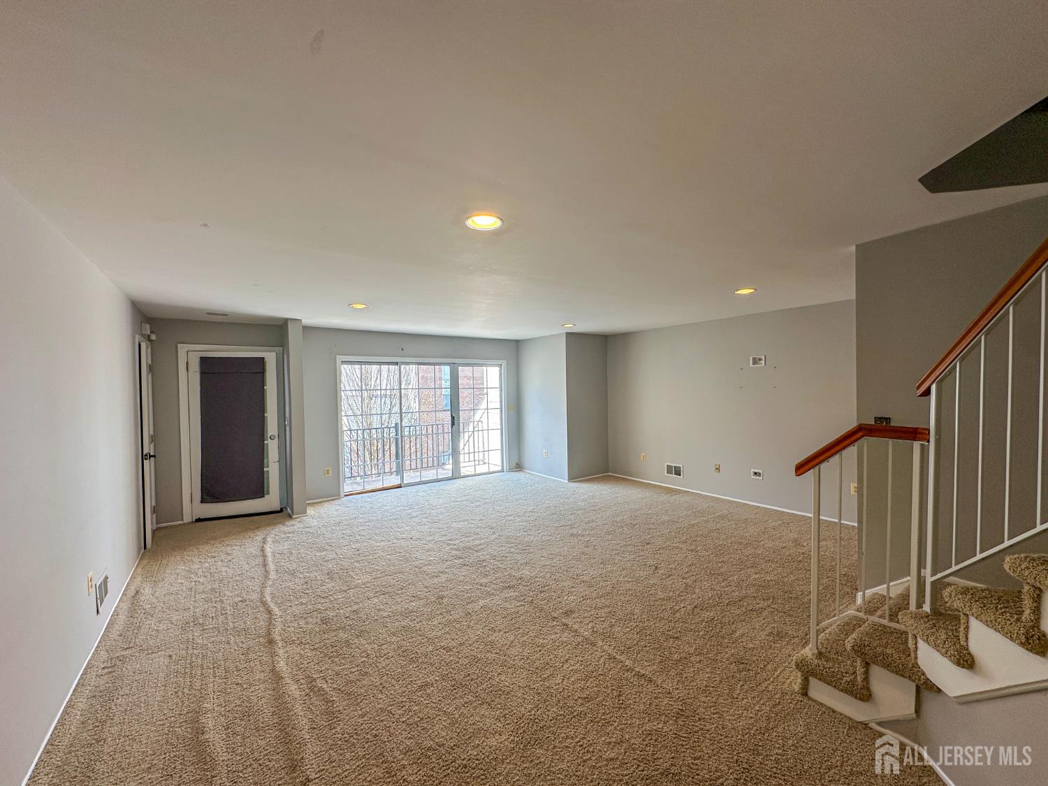 1212 Plymouth Road North Brunswick, NJ 08902 - Photo 8 of 27 a view of an empty room with a window