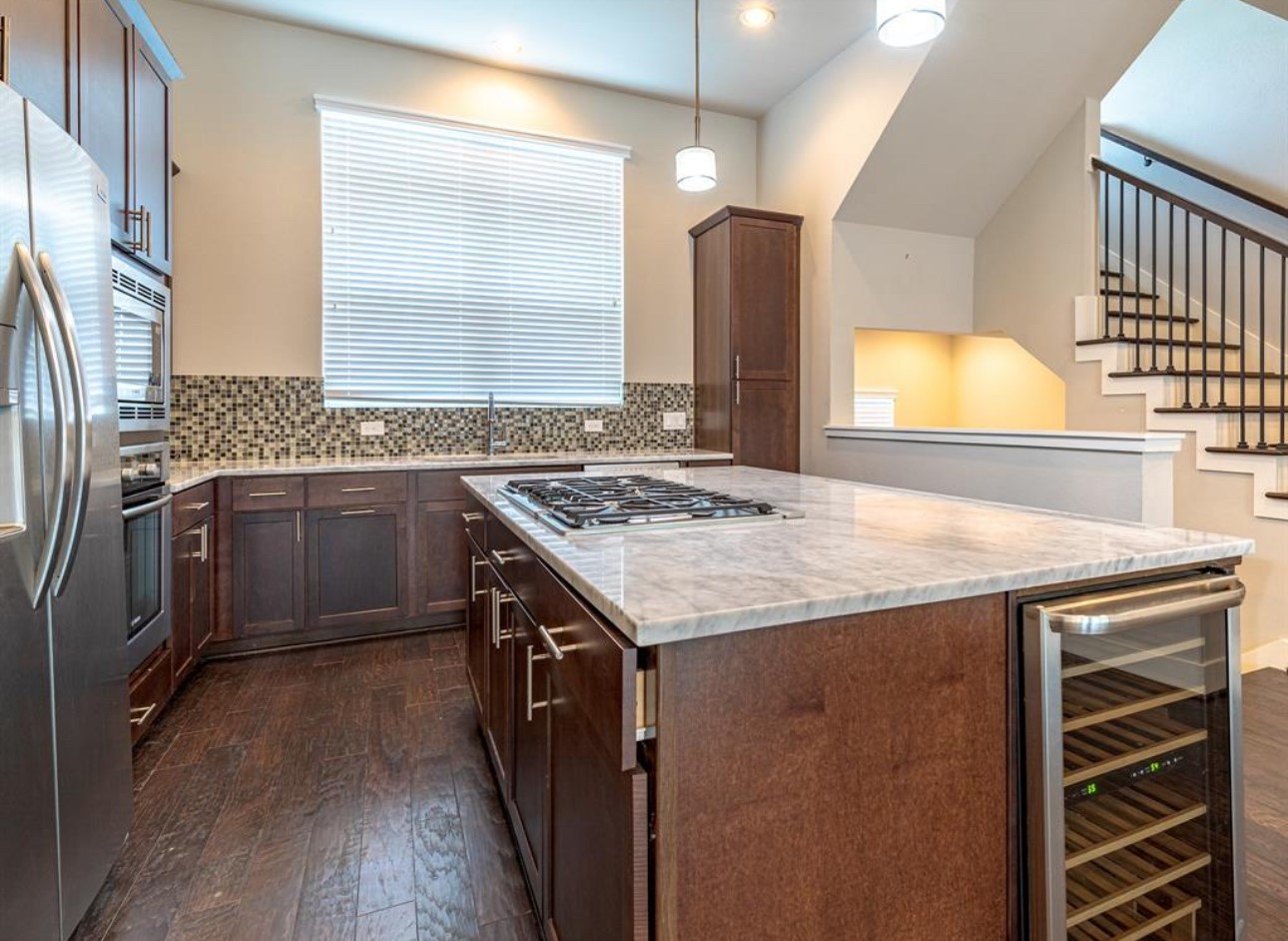 1441 Wagner Street Houston, TX 77007 - Photo 12 of 19 a kitchen with a sink stove and refrigerator