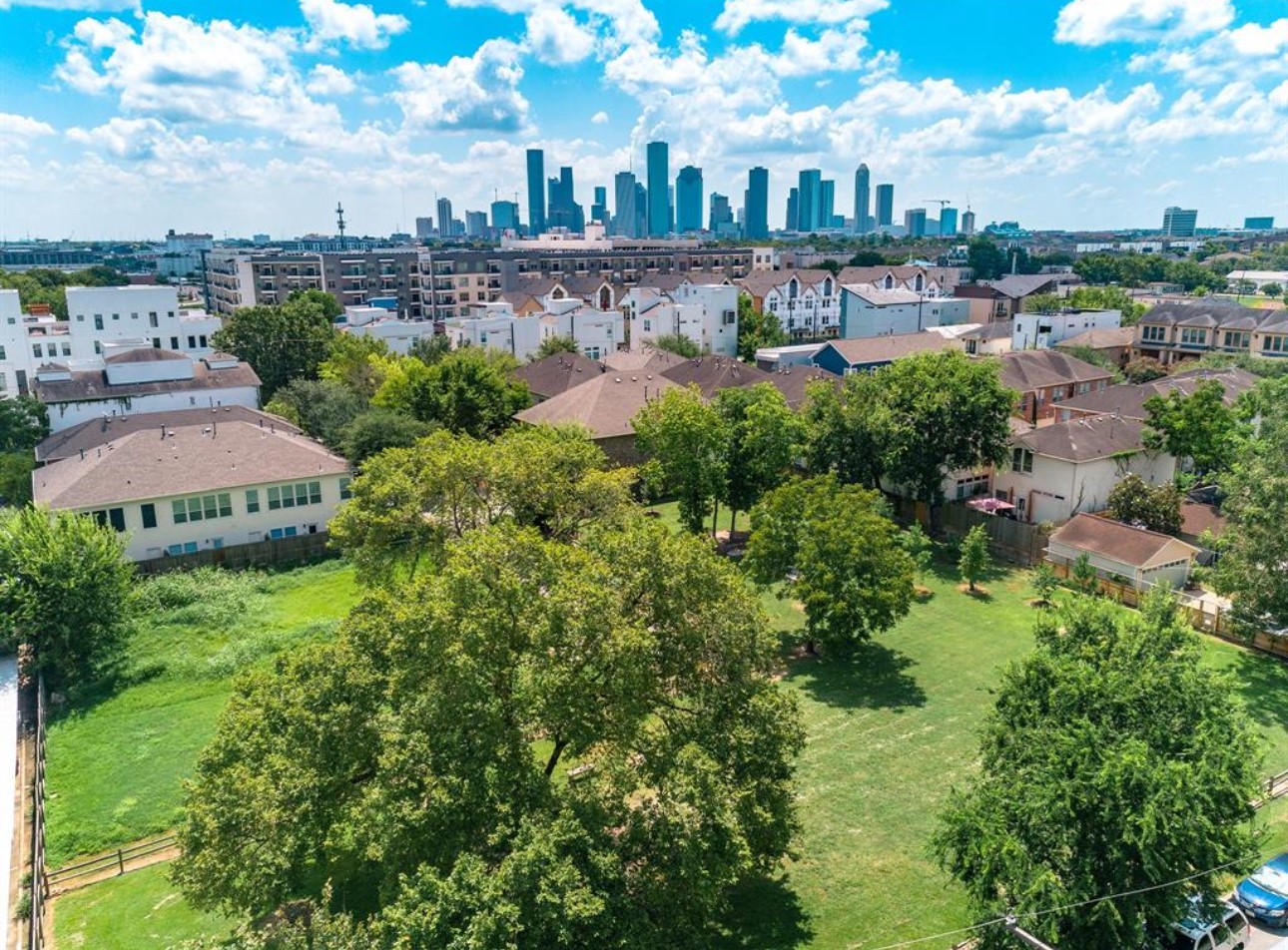 1441 Wagner Street Houston, TX 77007 - Photo 17 of 19 a view of a lake with a building in the background