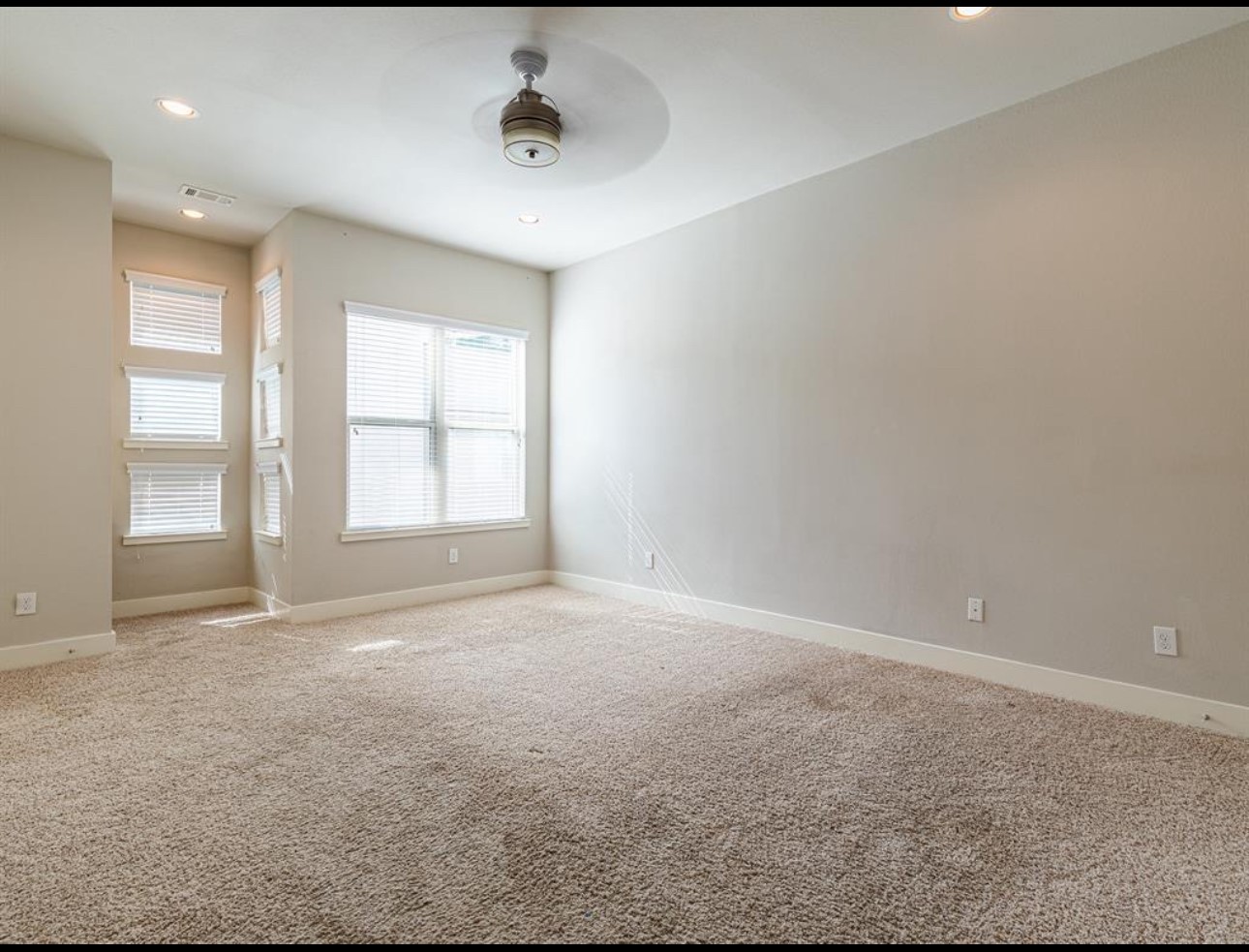 1441 Wagner Street Houston, TX 77007 - Photo 9 of 19 a view of an empty room with a window