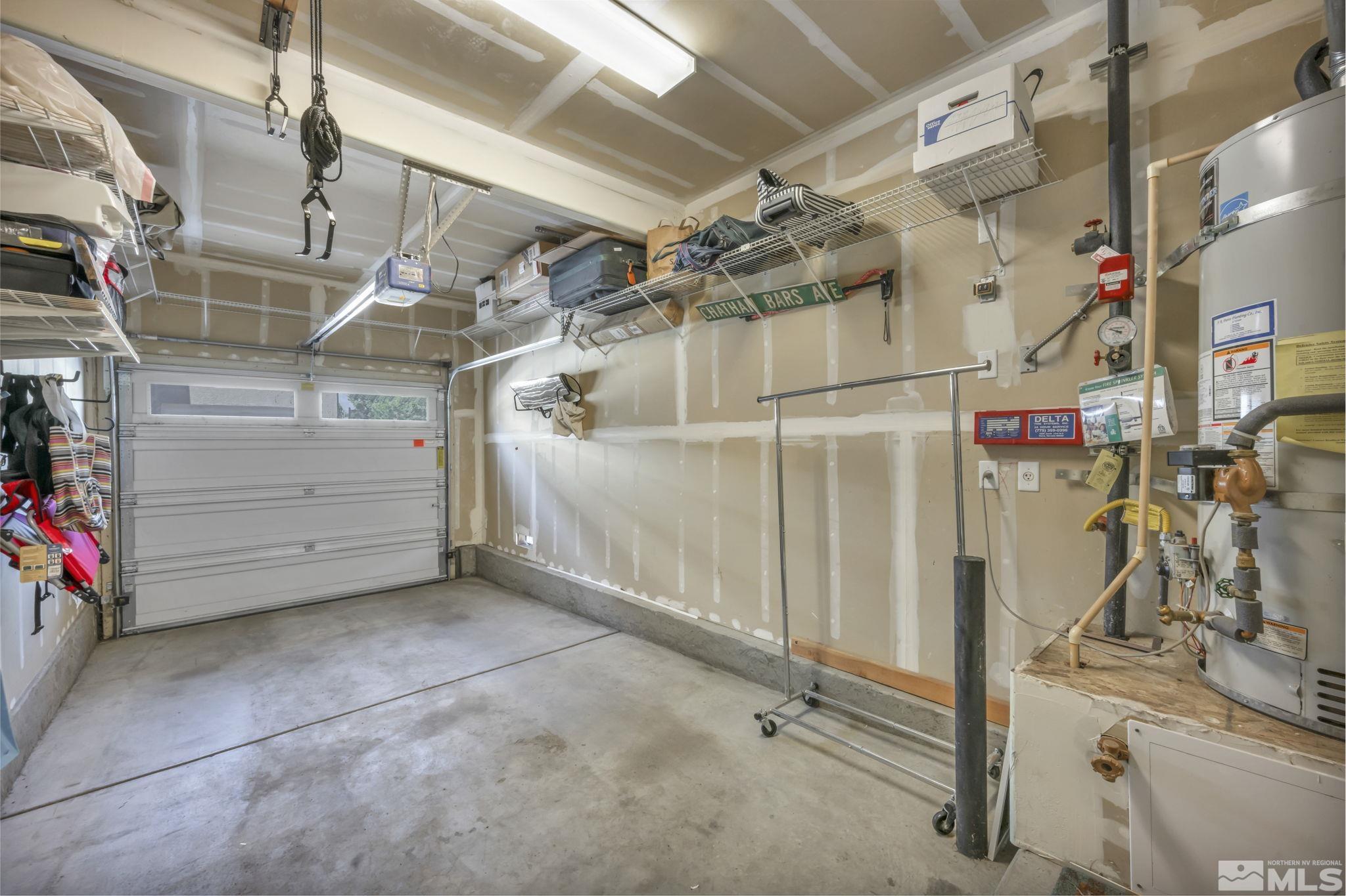 1924 Wind Ranch Road, Unit C Reno, NV 89521 - Photo 27 of 27 a utility room with cabinets