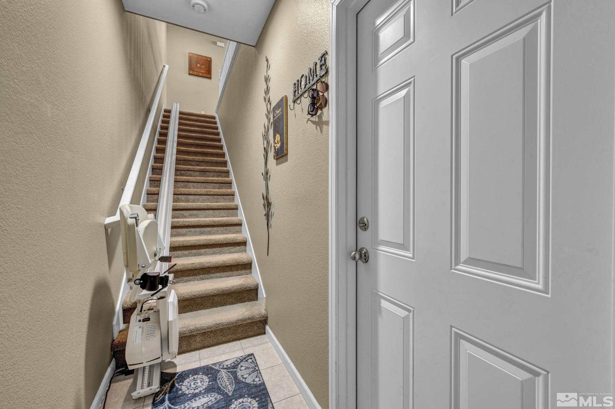 1924 Wind Ranch Road, Unit C Reno, NV 89521 - Photo 4 of 27 a view of an entryway with staircase