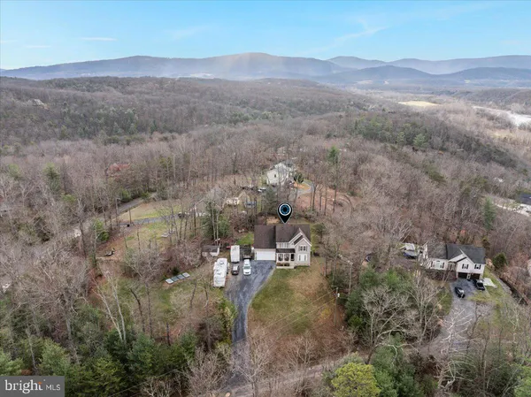 a kitchen with refrigerator and cabinets
