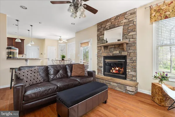 a kitchen with a stove a sink and a refrigerator