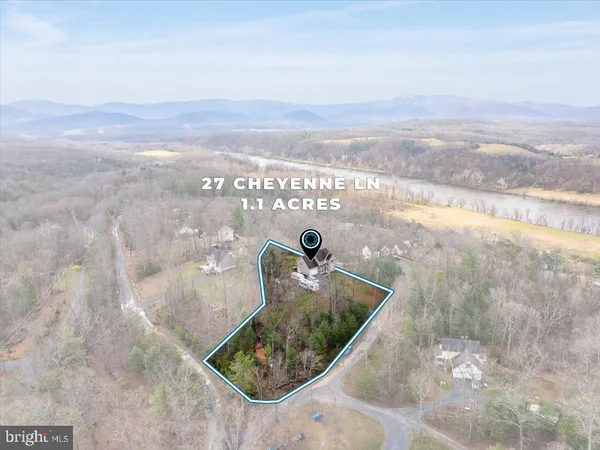 a view of a patio with a yard