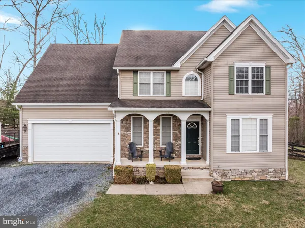 a swimming pool with trees in the background