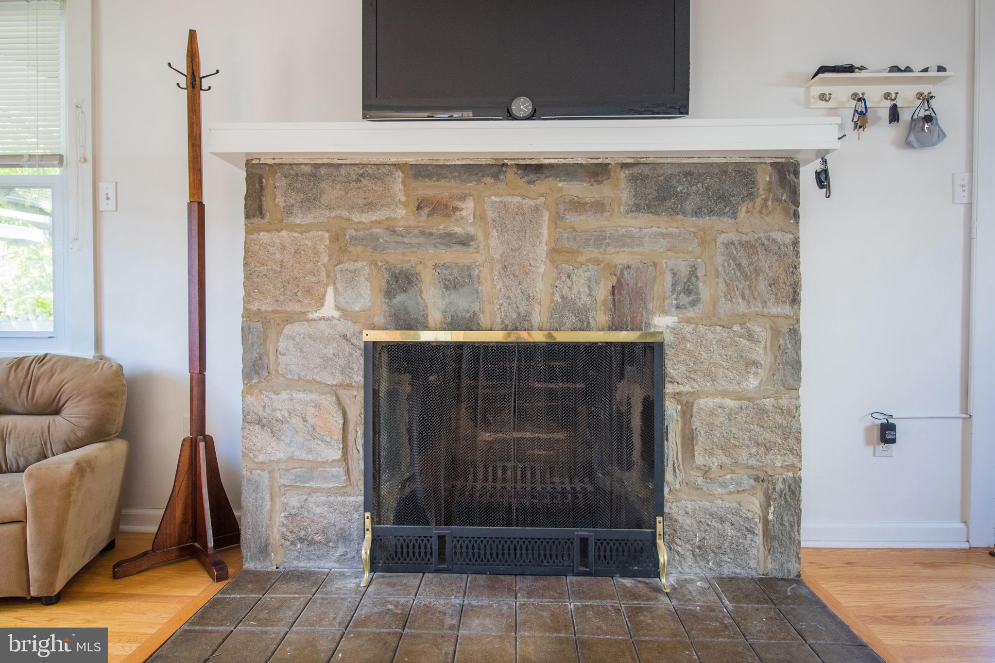 34 Delaware Avenue Ridley Park, PA 19078 - Photo 18 of 41 Decorative Stone Fireplace w/ Wood Mantel