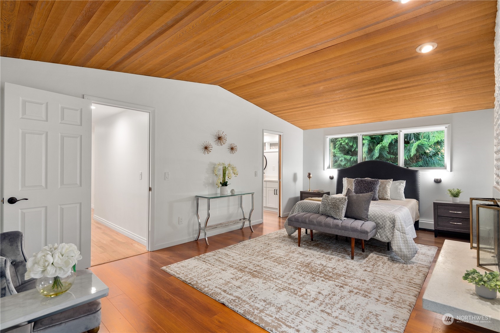 11030 Circle Drive Bothell, WA 98011 - Photo 16 of 38 a living room with furniture and a wooden floor