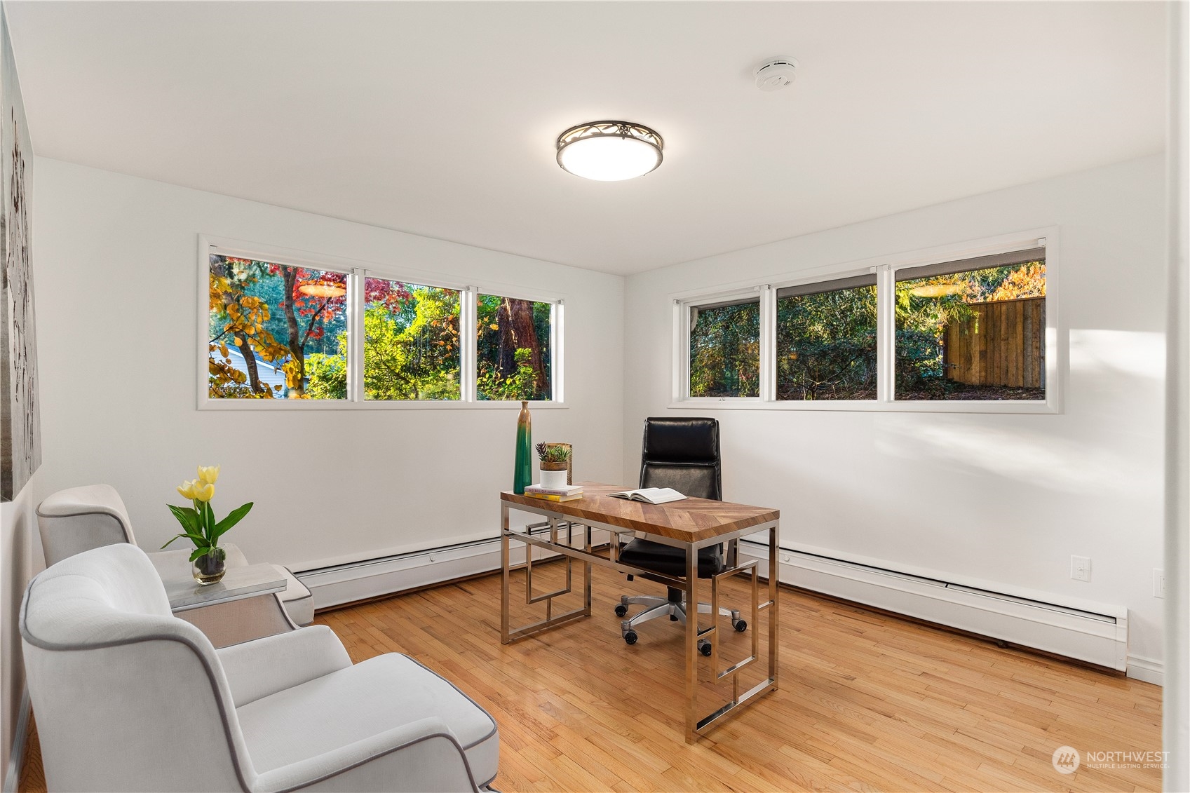 11030 Circle Drive Bothell, WA 98011 - Photo 19 of 38 a living room with furniture and a flat screen tv