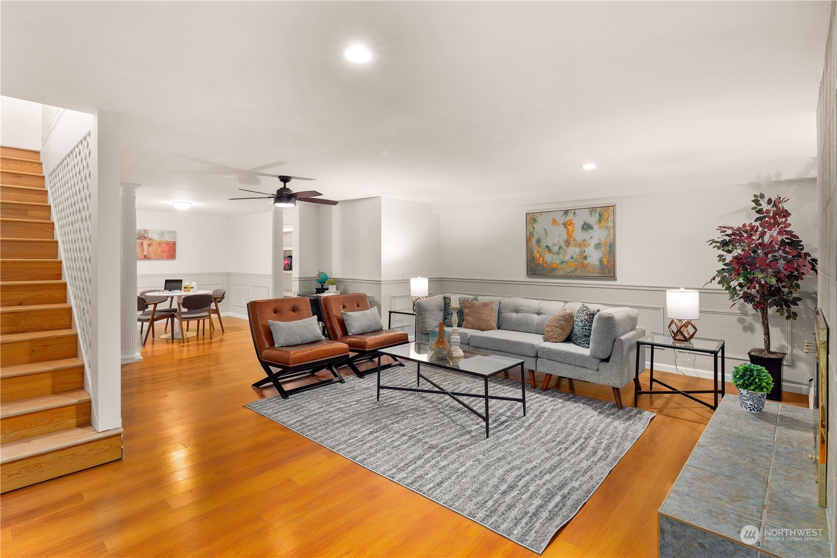 11030 Circle Drive Bothell, WA 98011 - Photo 23 of 38 a living room with furniture and a potted plant