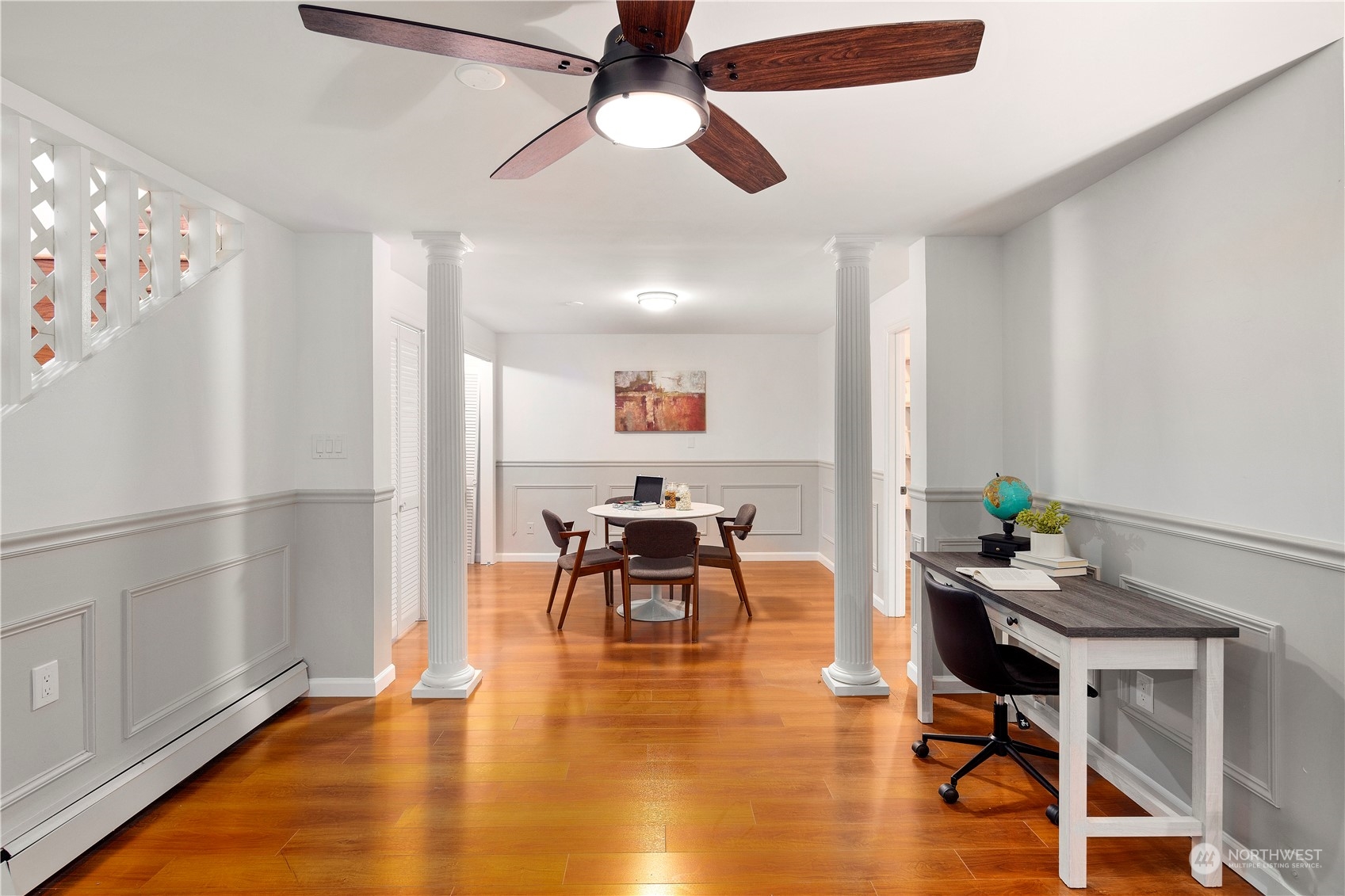 11030 Circle Drive Bothell, WA 98011 - Photo 25 of 38 a work room with furniture and wooden floor