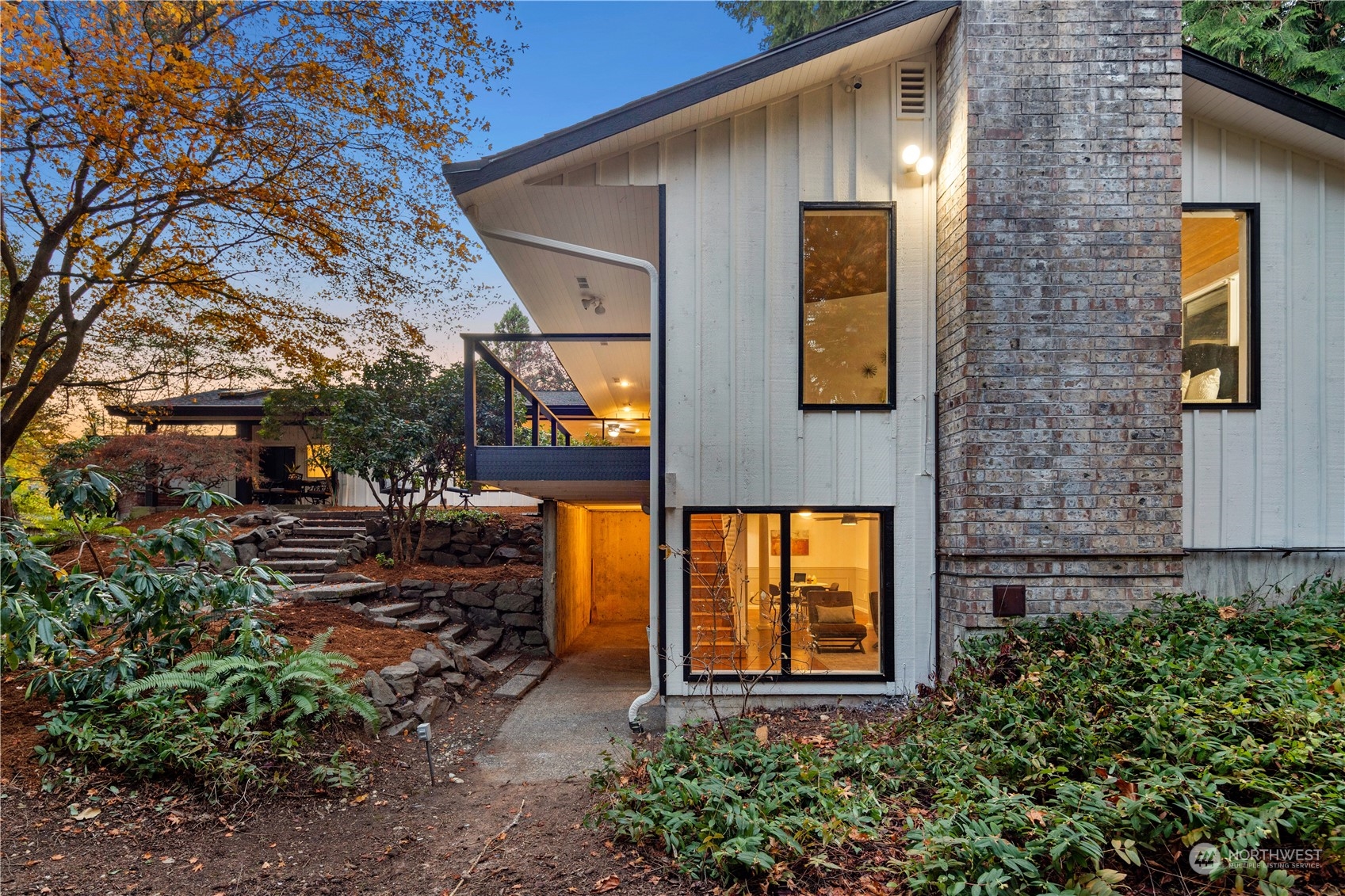 11030 Circle Drive Bothell, WA 98011 - Photo 30 of 38 a front view of a house with garden