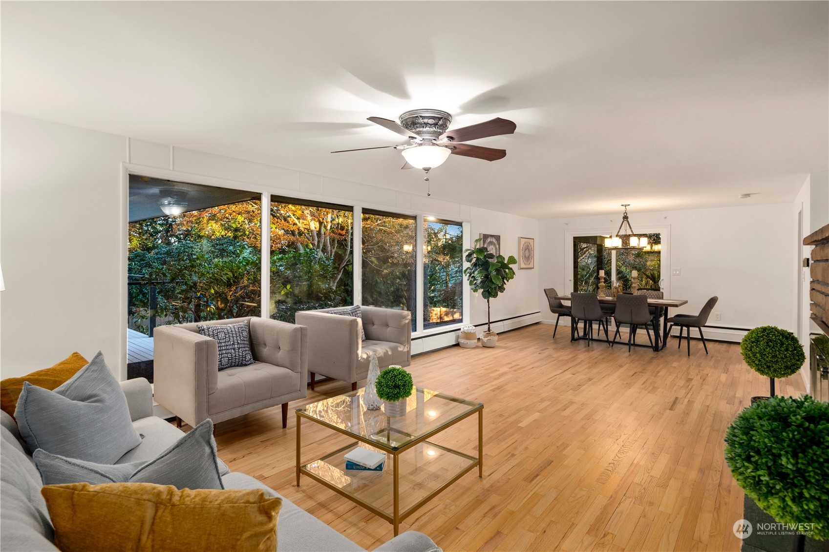 11030 Circle Drive Bothell, WA 98011 - Photo 8 of 38 a living room with furniture and a large window