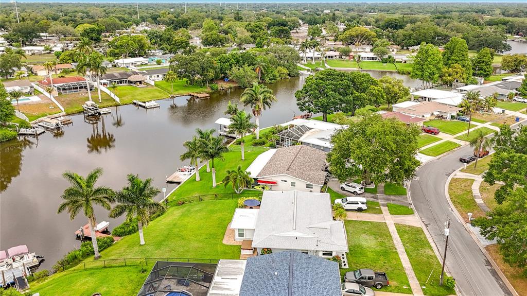 508 Shore Drive Largo, FL 33771 - Photo 29 of 31 an aerial view of residential houses with outdoor space