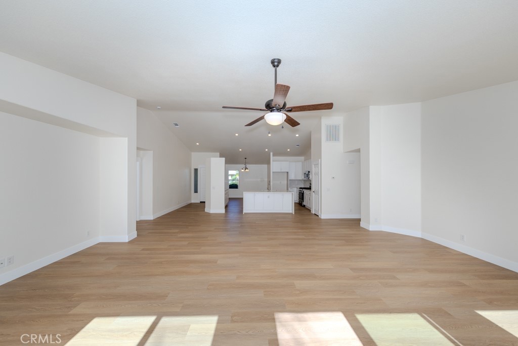 80675 Independence Avenue Indio, CA 92201 - Photo 16 of 72 a view of a livingroom with a ceiling fan and window
