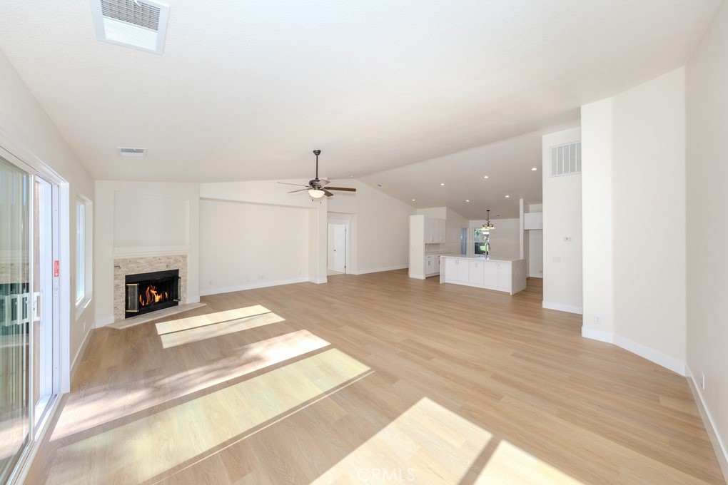 80675 Independence Avenue Indio, CA 92201 - Photo 22 of 72 a view of a kitchen with a sink and a fireplace