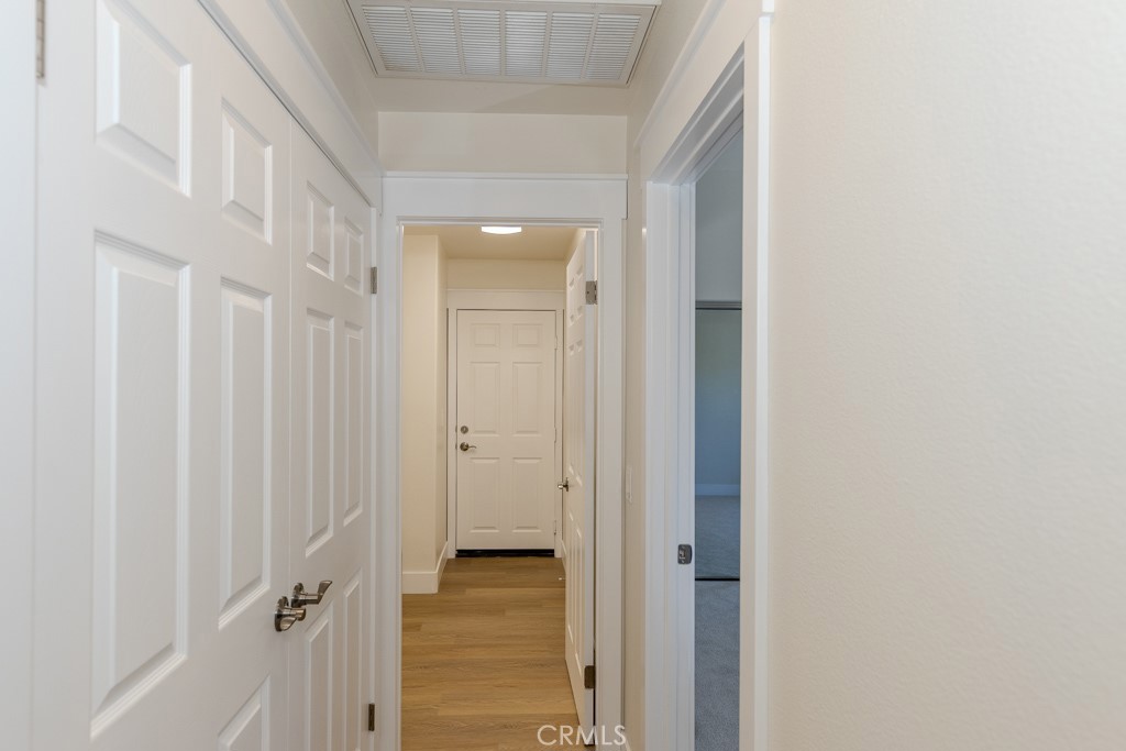 80675 Independence Avenue Indio, CA 92201 - Photo 45 of 72 Hallway toward Laundry Room & Garage access door