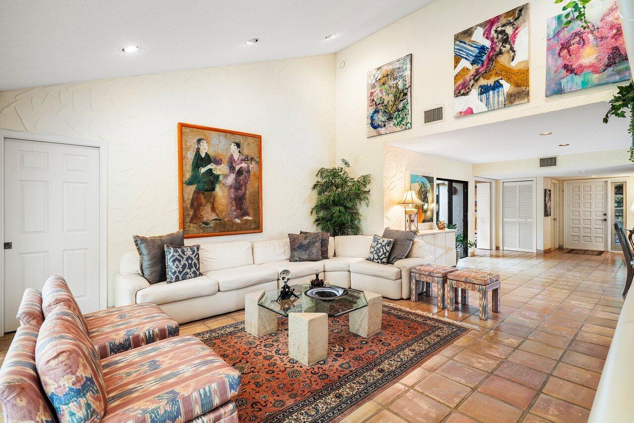 11094 Applegate Lane Boynton Beach, FL 33437 - Photo 17 of 52 a living room with furniture and a painting