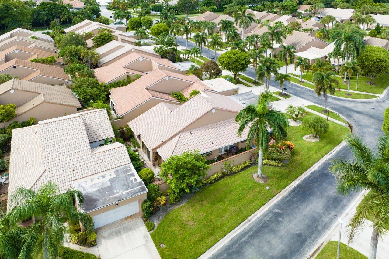 11094 Applegate Lane Boynton Beach, FL 33437 - Photo 43 of 52 an aerial view of a residential houses with yard