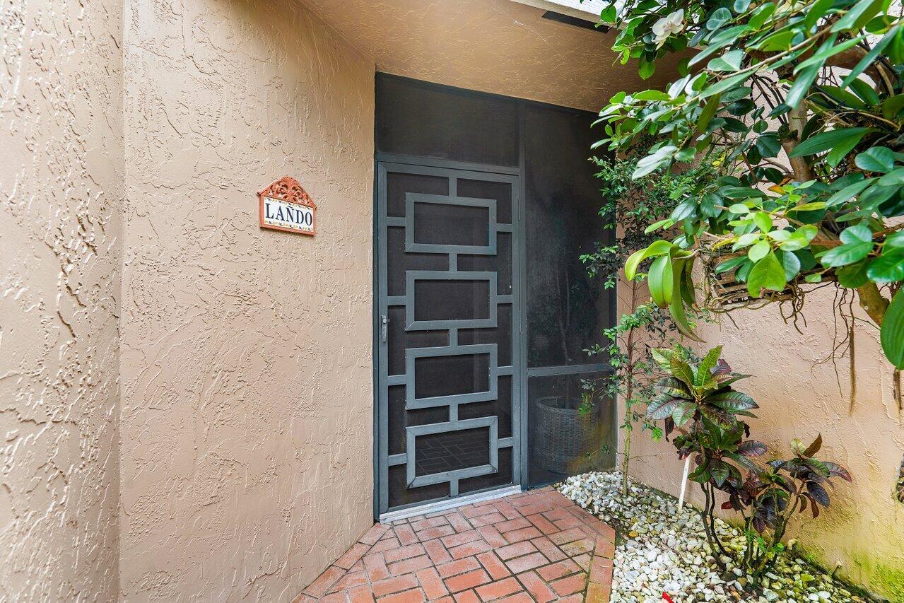 11094 Applegate Lane Boynton Beach, FL 33437 - Photo 5 of 52 a view of a wooden closet