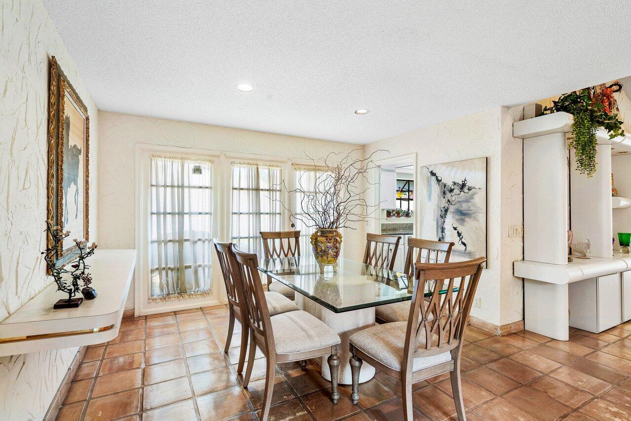 11094 Applegate Lane Boynton Beach, FL 33437 - Photo 8 of 52 a view of a dining room with furniture window and outside view