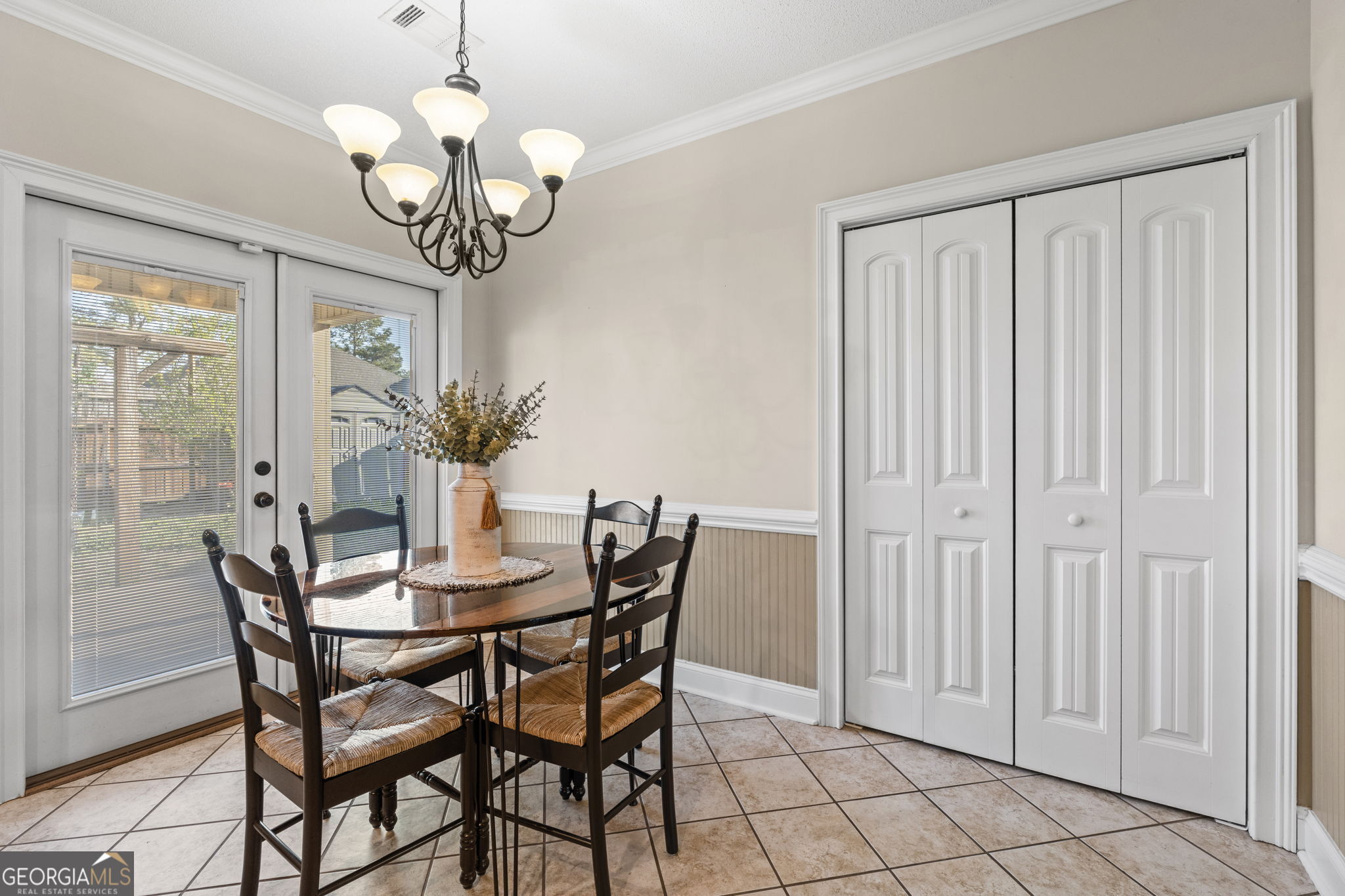 620 Amherst Street Kathleen, GA 31047 - Photo 11 of 31 a view of a dining room with furniture and chandelier