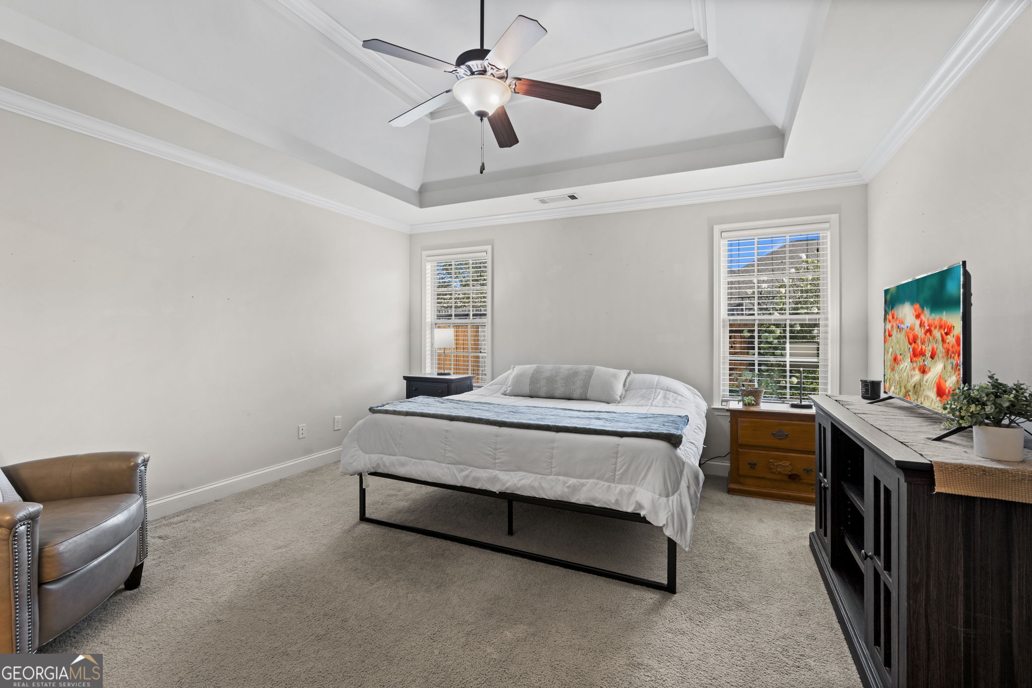 620 Amherst Street Kathleen, GA 31047 - Photo 20 of 31 a bedroom with a bed and a flat screen tv