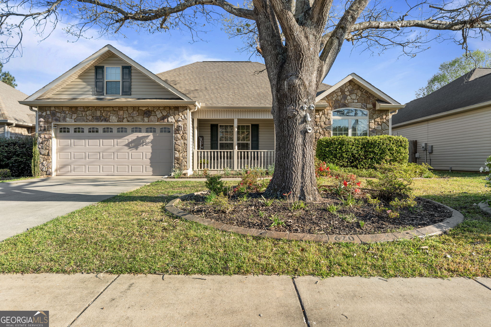620 Amherst Street Kathleen, GA 31047 - Photo 2 of 31 a front view of a house with garden