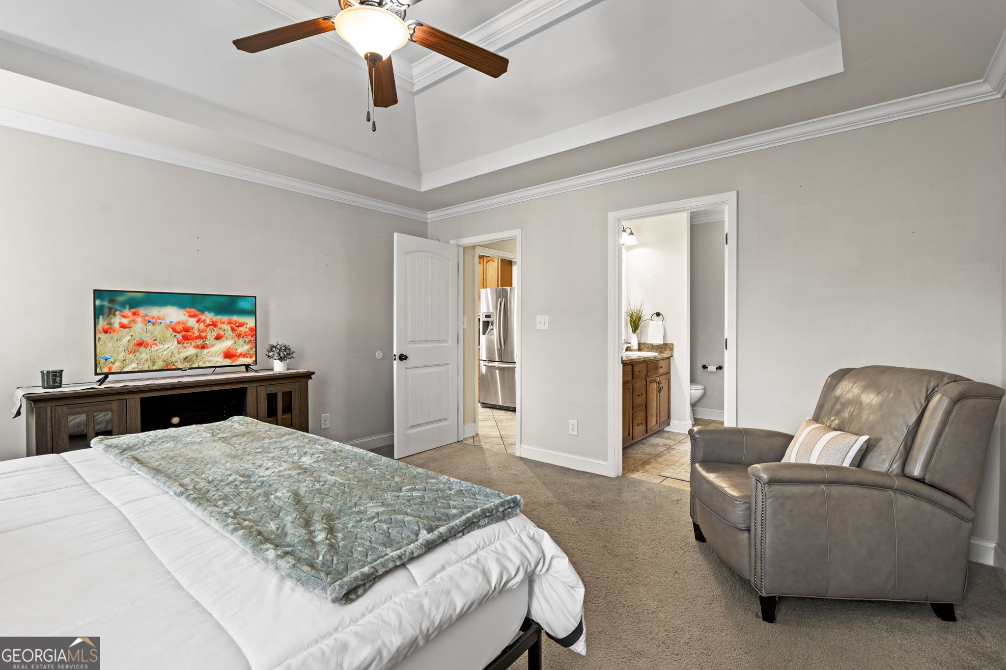 620 Amherst Street Kathleen, GA 31047 - Photo 22 of 31 a bedroom with a bed and a flat screen tv