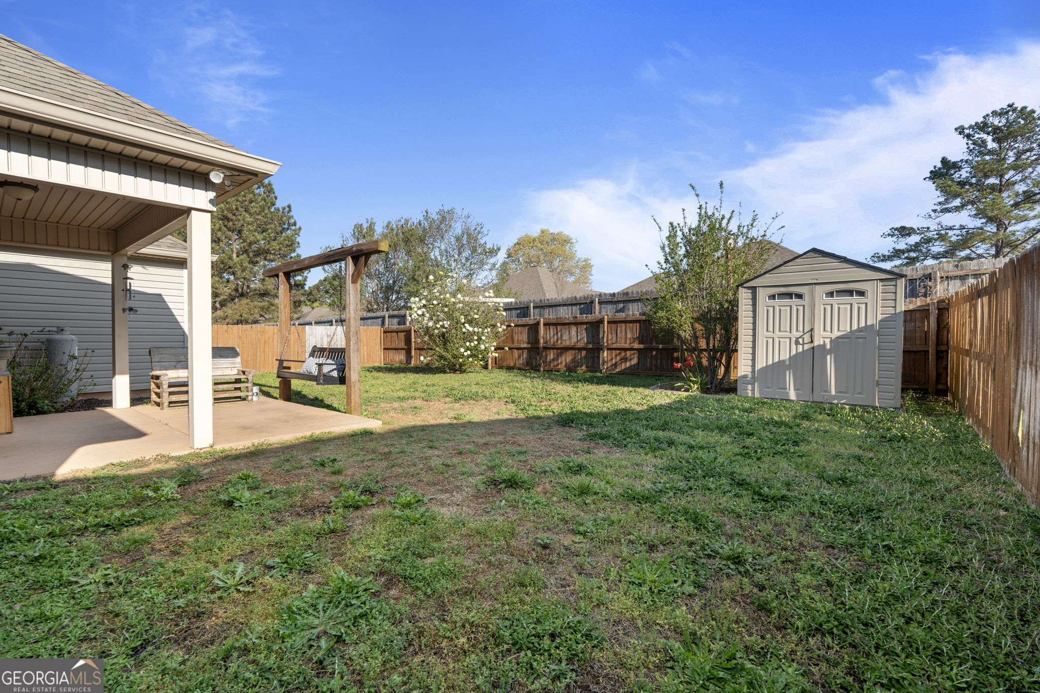 620 Amherst Street Kathleen, GA 31047 - Photo 31 of 31 a view of a house with backyard and sitting area