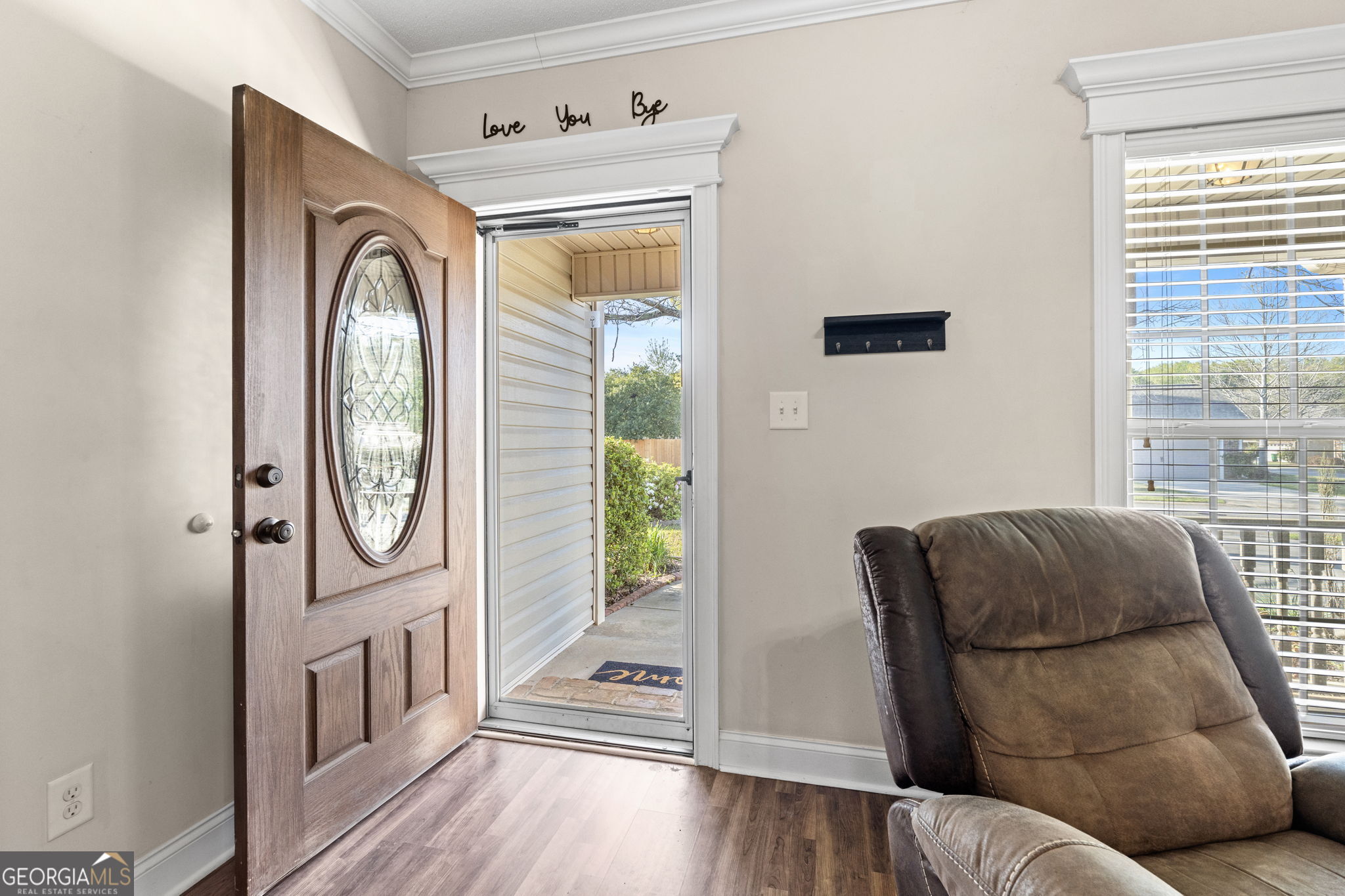 620 Amherst Street Kathleen, GA 31047 - Photo 5 of 31 a living room with furniture and a window