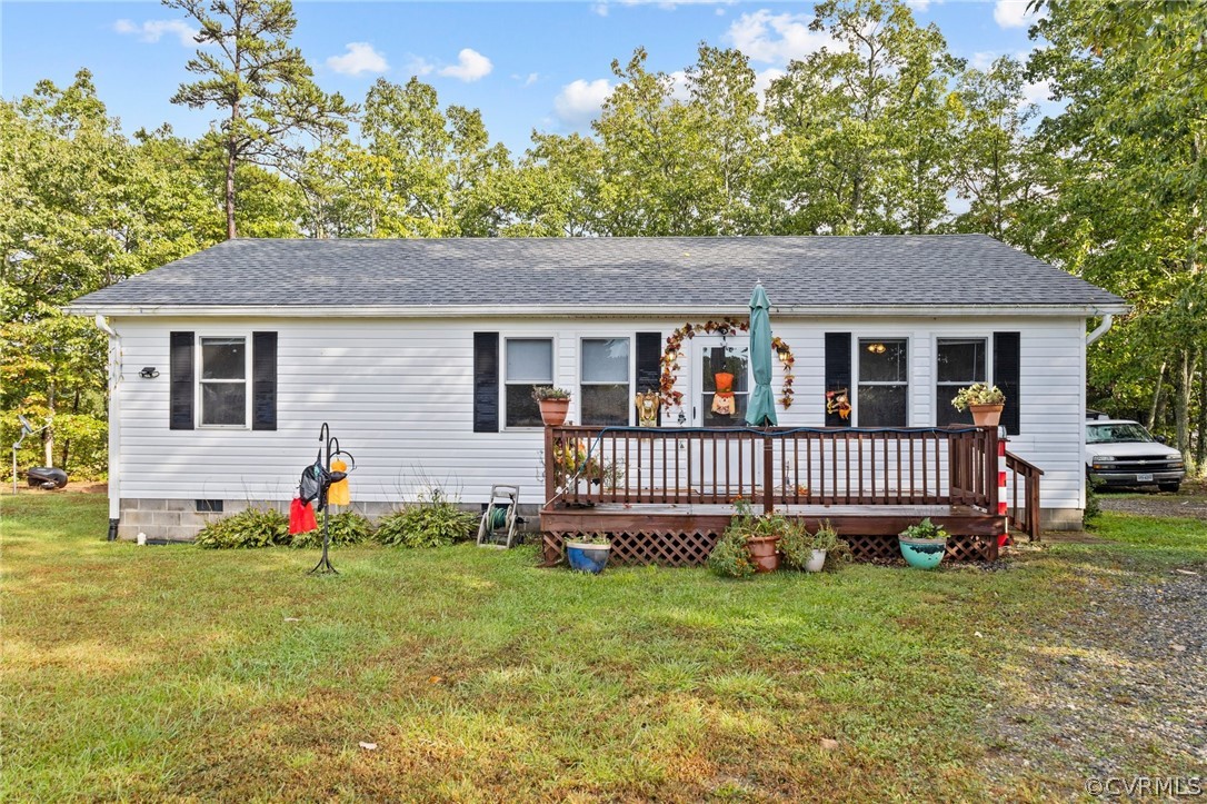 650 Johnson Road Mineral, VA 23117 - Photo 1 of 29 a front view of a house with a garden