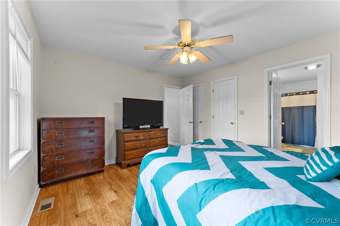 650 Johnson Road Mineral, VA 23117 - Photo 11 of 29 a bedroom with a bed and a flat screen tv