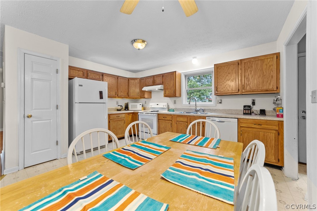 650 Johnson Road Mineral, VA 23117 - Photo 17 of 29 a living room filled with furniture and kitchen view