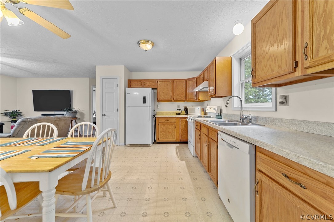 650 Johnson Road Mineral, VA 23117 - Photo 18 of 29 a kitchen with stainless steel appliances kitchen island granite countertop a sink and a stove