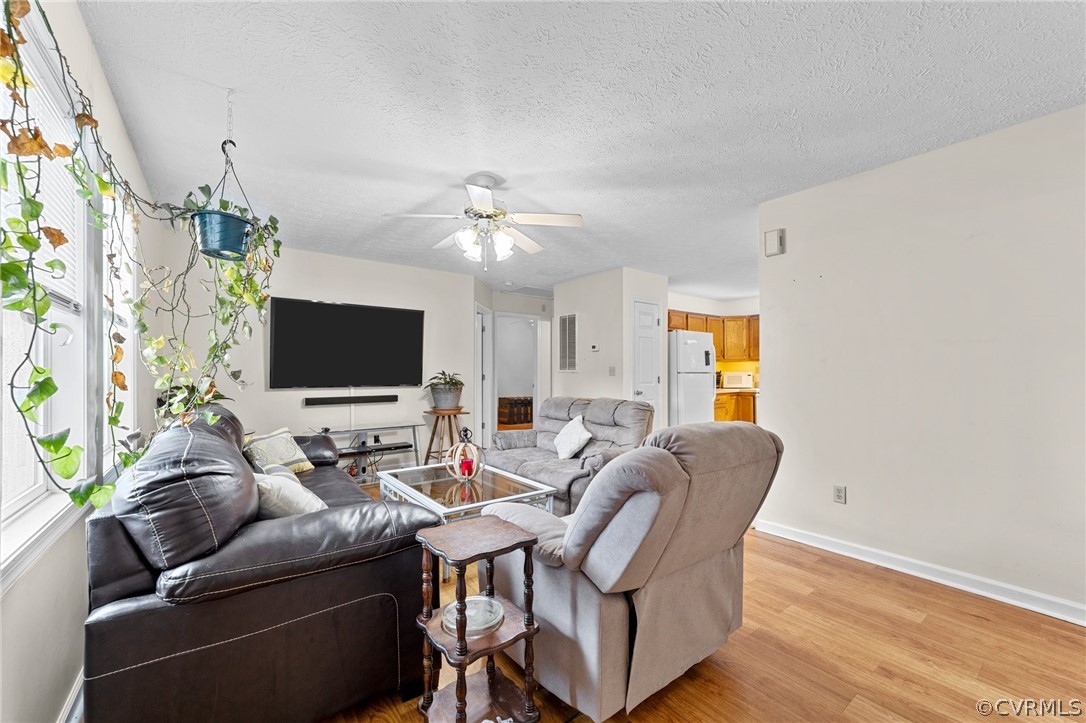 650 Johnson Road Mineral, VA 23117 - Photo 19 of 29 a living room with furniture and a flat screen tv