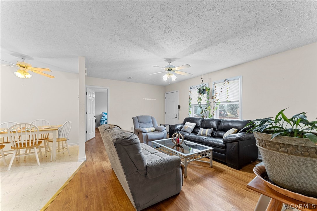 650 Johnson Road Mineral, VA 23117 - Photo 21 of 29 a living room with furniture and a chandelier
