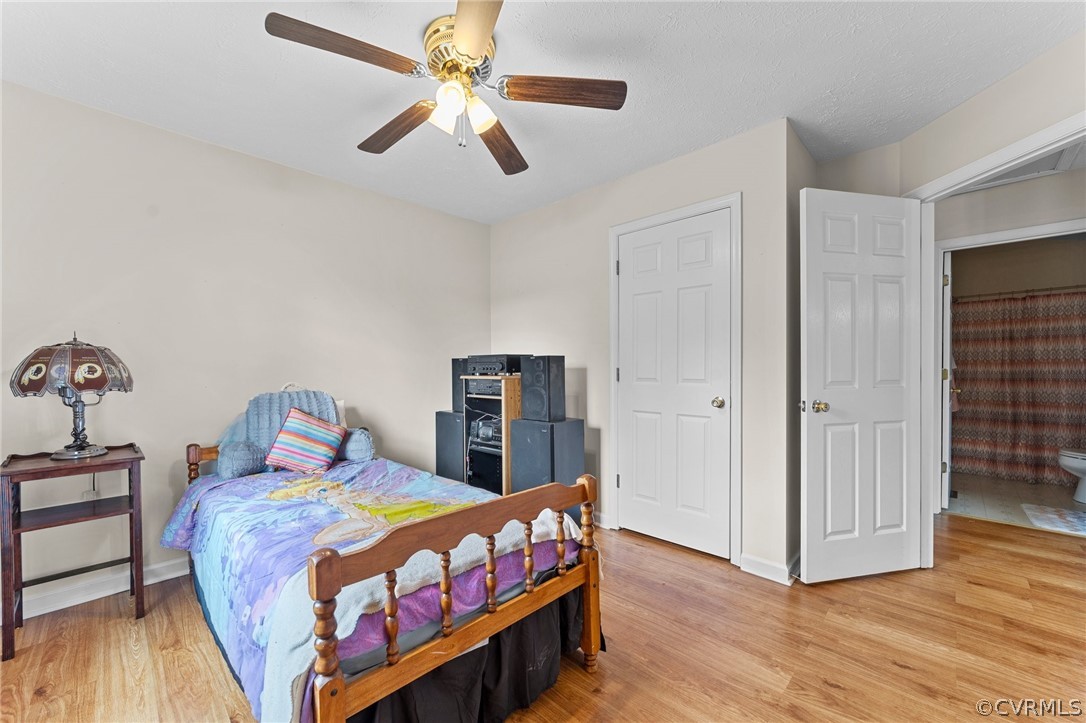 650 Johnson Road Mineral, VA 23117 - Photo 24 of 29 a bedroom with a bed and wooden floor