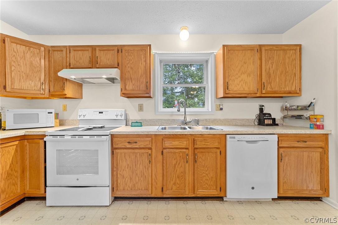 650 Johnson Road Mineral, VA 23117 - Photo 26 of 29 a kitchen with a sink stove and cabinets
