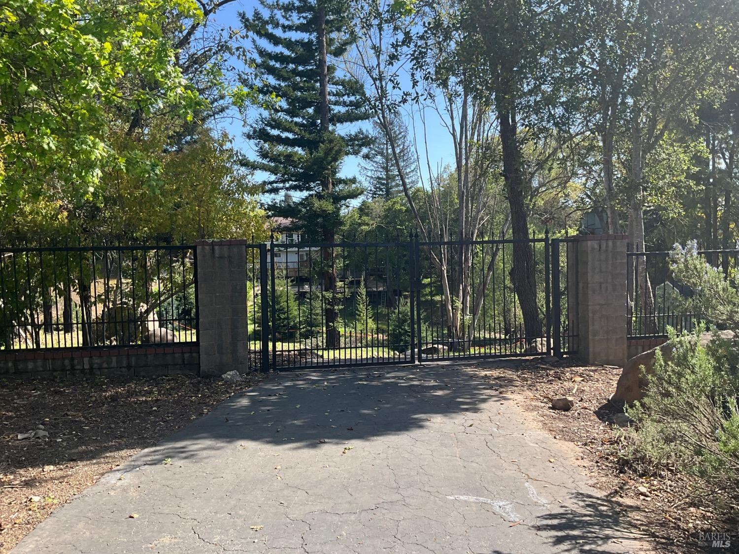 5258 Beaumont Way Santa Rosa, CA 95409 - Photo 1 of 1 a view of a park with large trees