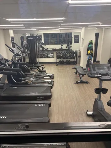 a bathroom with a bathtub and a window