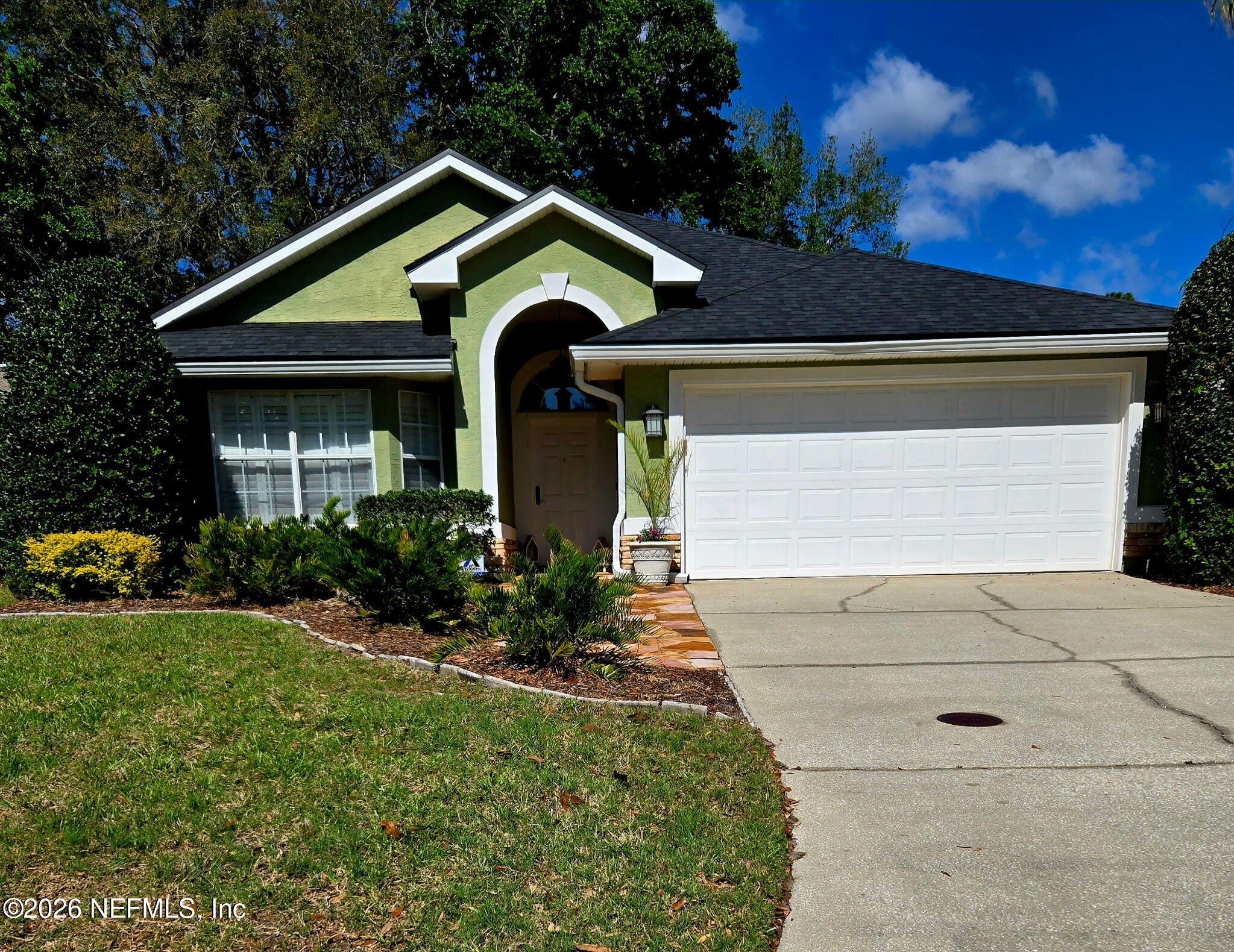 1424 Tintern Lane St. Augustine, FL 32092 - Photo 2 of 32 a front view of a house with a yard