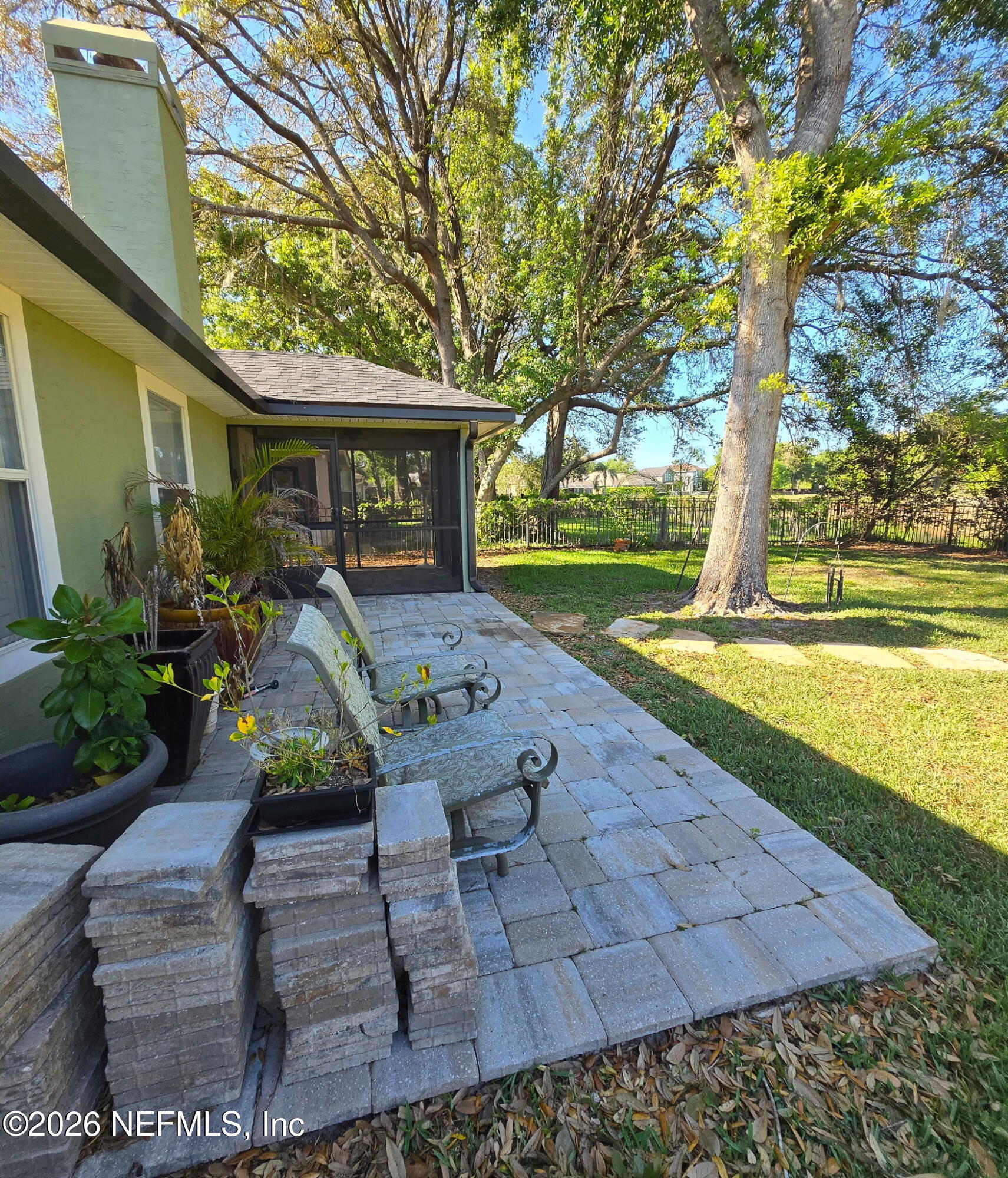 1424 Tintern Lane St. Augustine, FL 32092 - Photo 5 of 32 a view of a house with backyard and garden