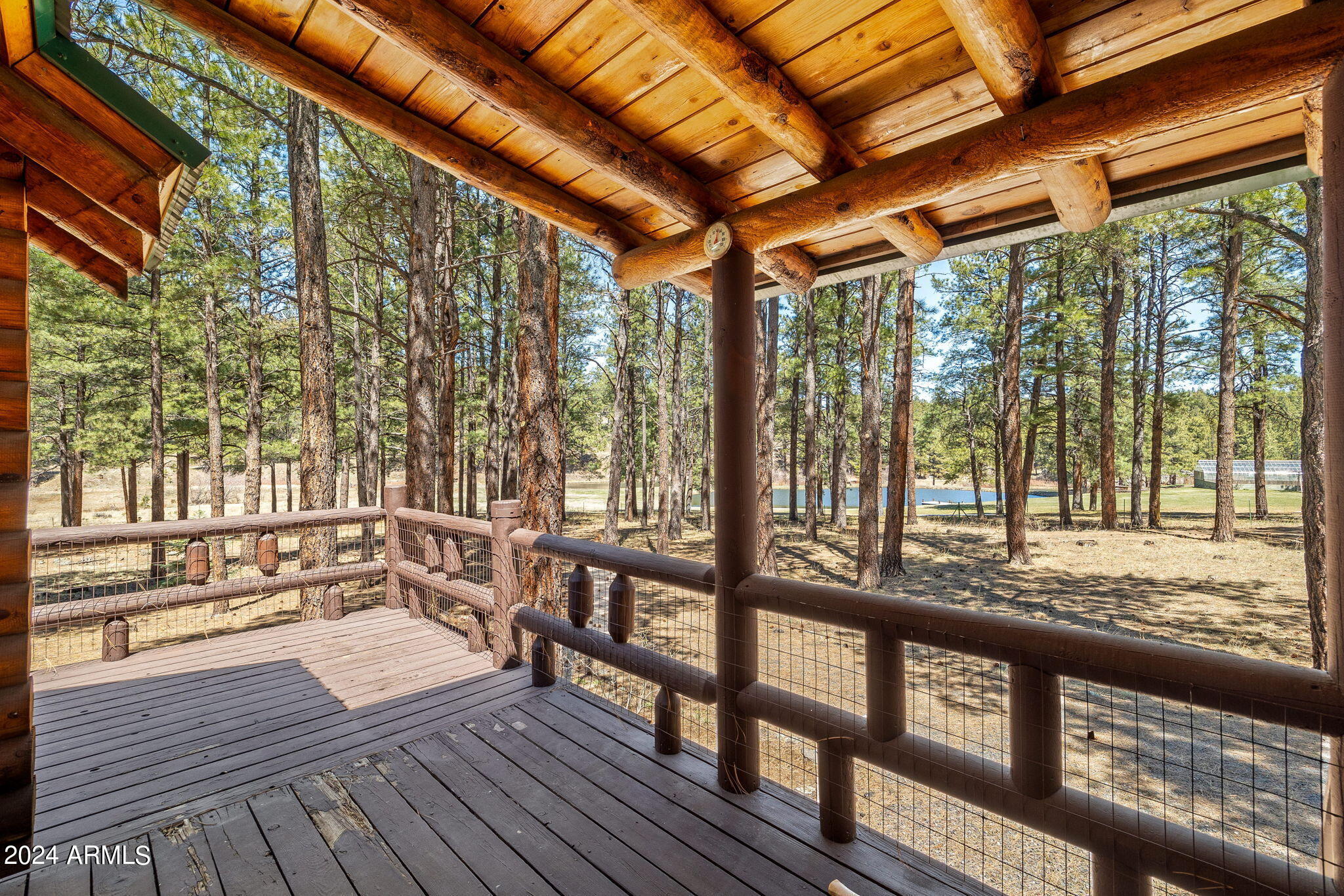 9 County Road Greer, AZ 85927 - Photo 19 of 33 a view of a porch with wooden floor