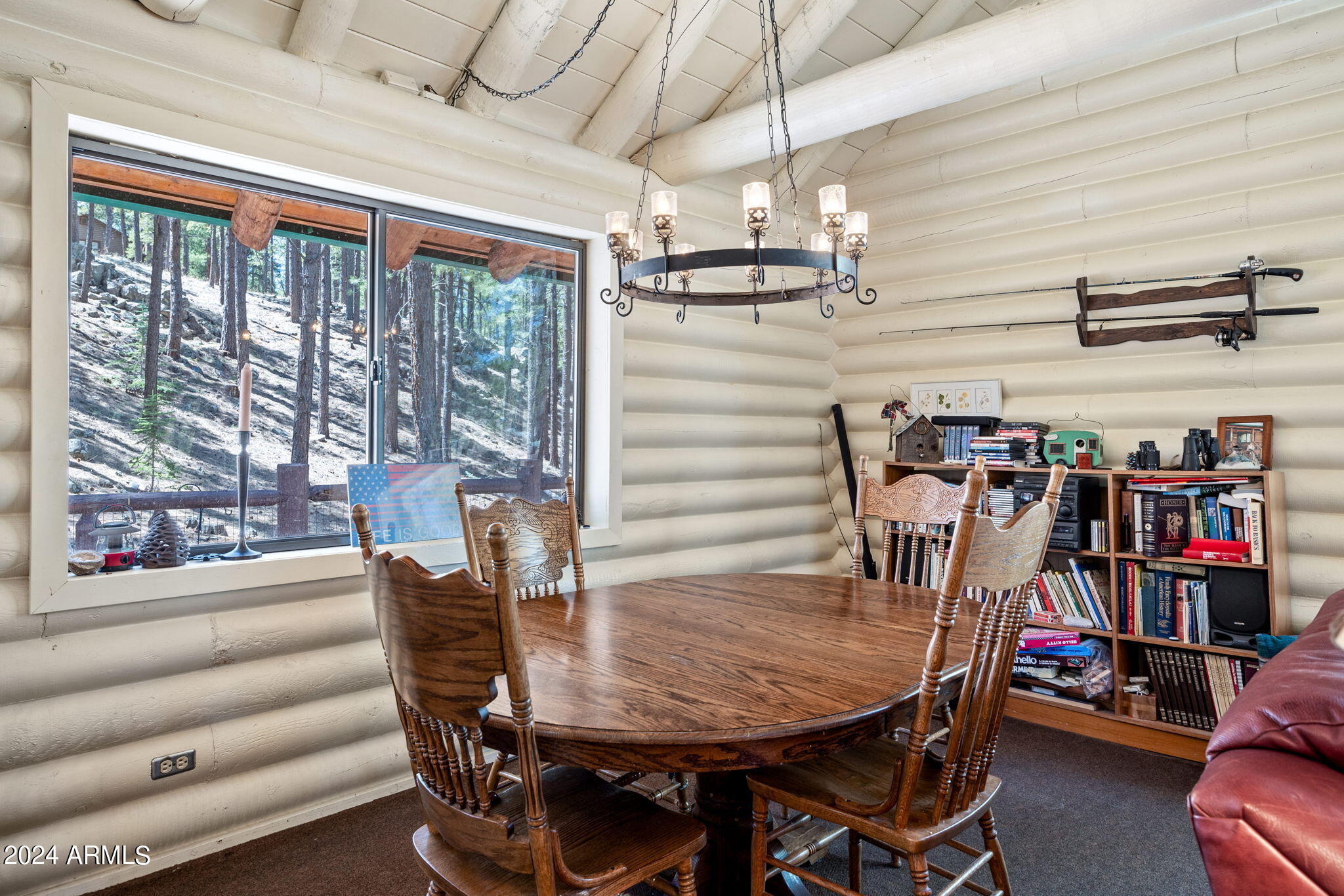 9 County Road Greer, AZ 85927 - Photo 23 of 33 a view of a dining room with furniture window and outside view