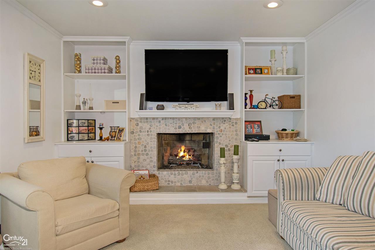 32306 Woody Road Fraser, MI 48026 - Photo 13 of 37 Family room with fireplace