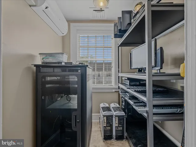 a kitchen with table and chairs