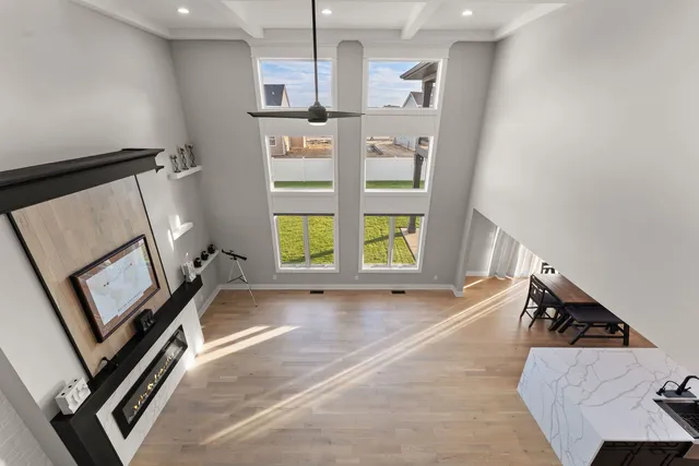 workspace with wooden floor and windows